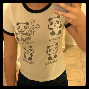 This is a juniors crop-top with a panda on it.